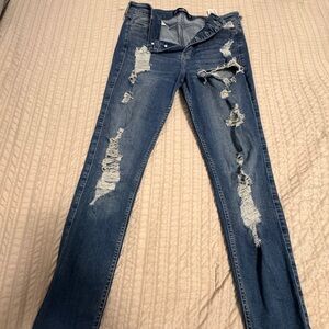 Distressed Blue Jeans